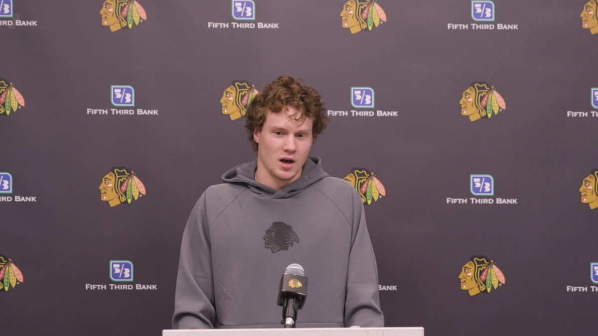 Marek Vanacker talks to reporters at Blackhawks development camp.