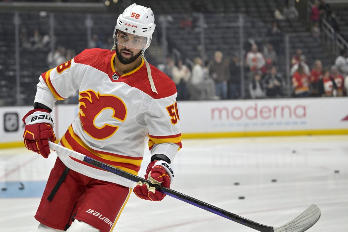 Apr 11, 2024; Los Angeles, California, USA; Calgary Flames defenseman Oliver Kylington (58) warms up prior to the game against the Los Angeles Kings at Crypto.com Arena.