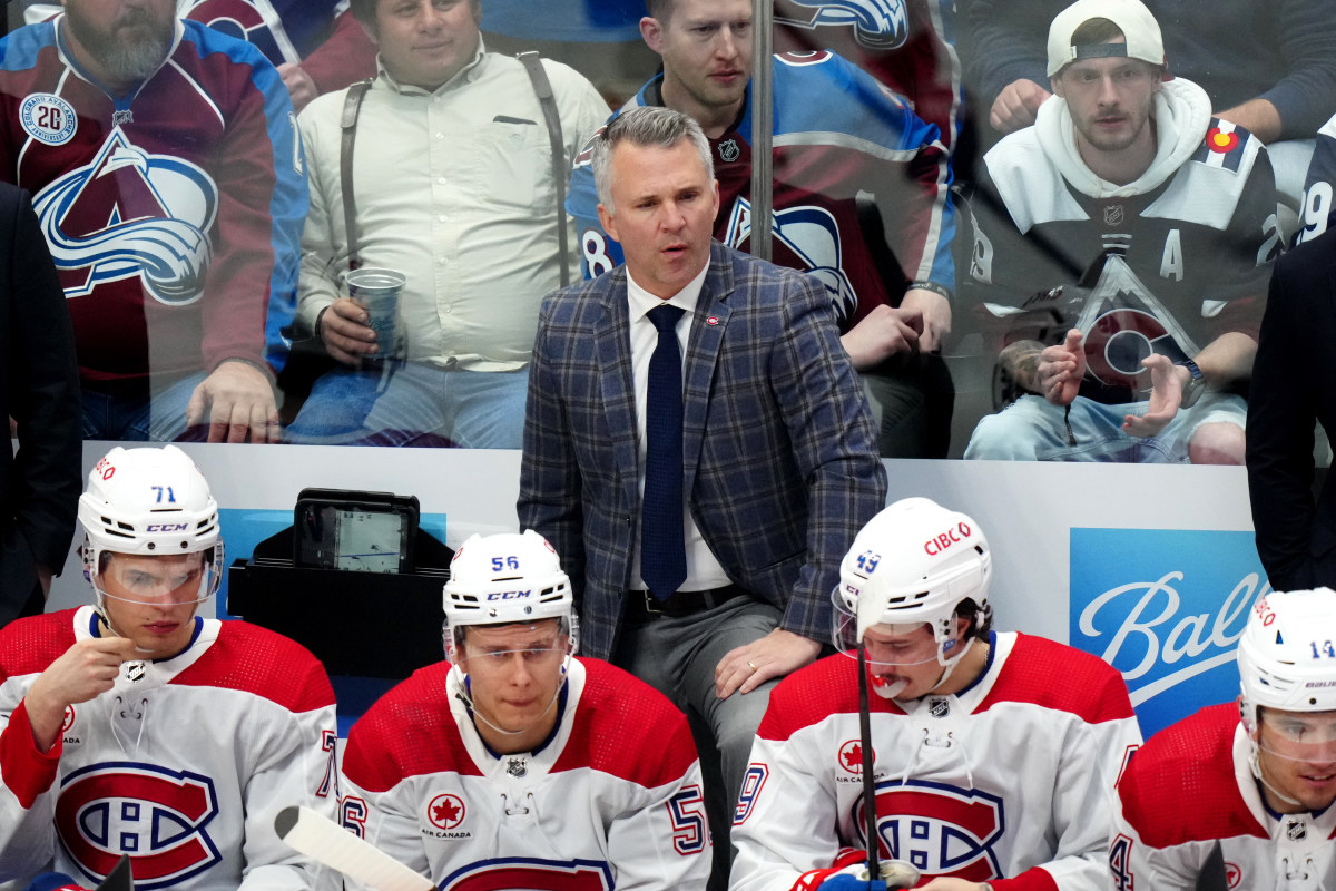 Mar 26, 2024; Denver, Colorado, USA; Montreal Canadiens head coach Martin St. Louis during the first period against the Colorado Avalanche at Ball Arena. Mandatory Credit: Ron Chenoy-Imagn Images