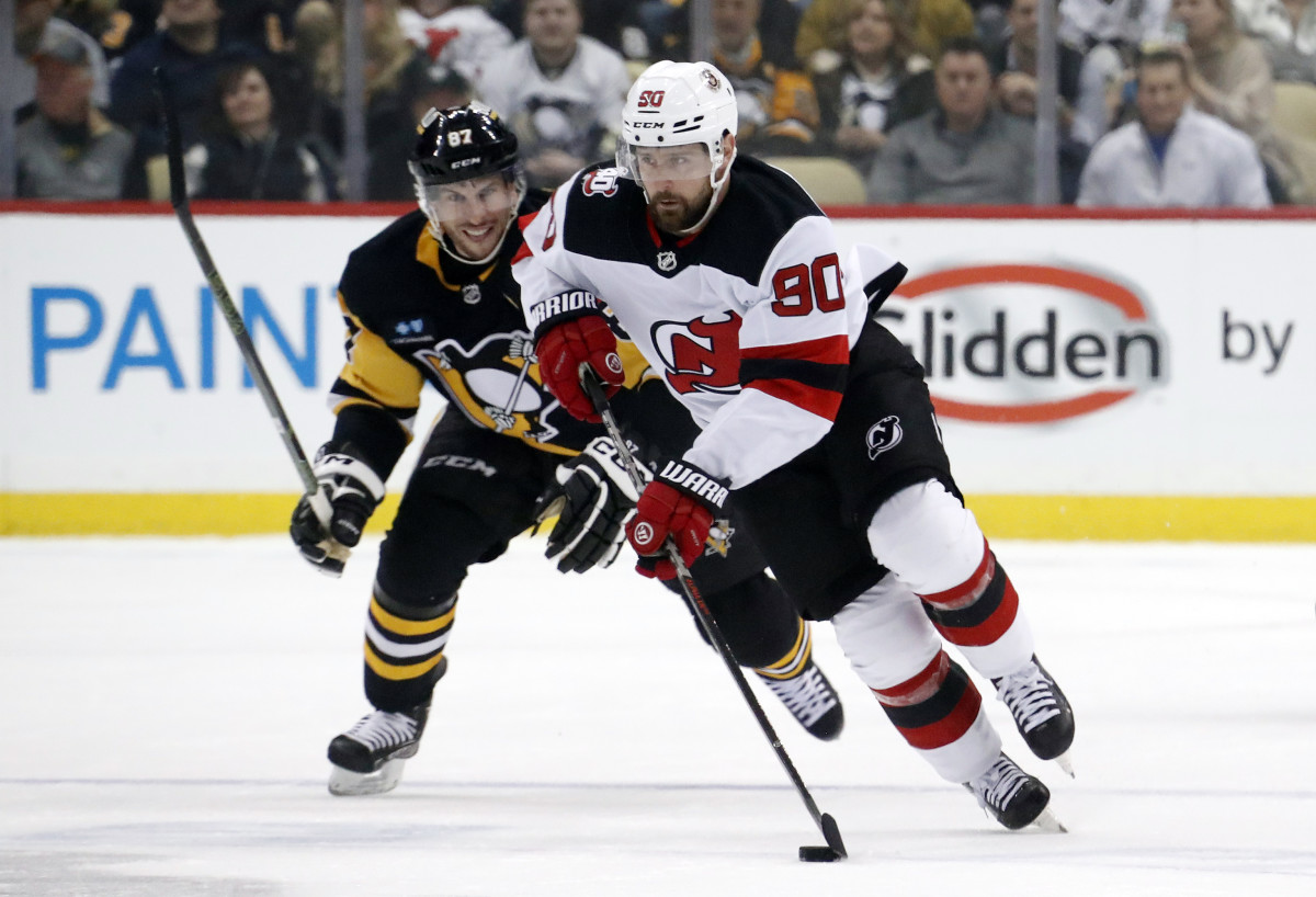 New Jersey Devils' Ondrej Palat (18) skates with the puck against