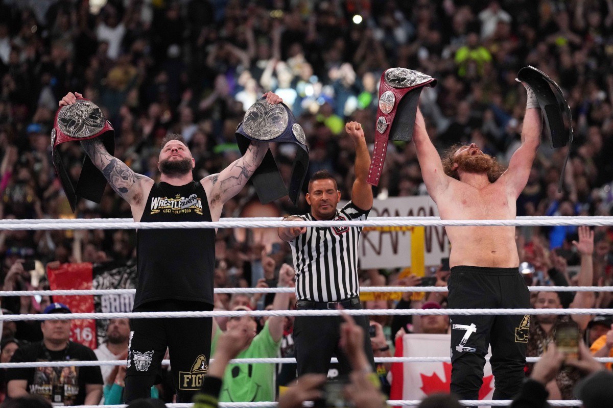 WWE Superstars Sport Pittsburgh Penguins Jerseys in Title Match The