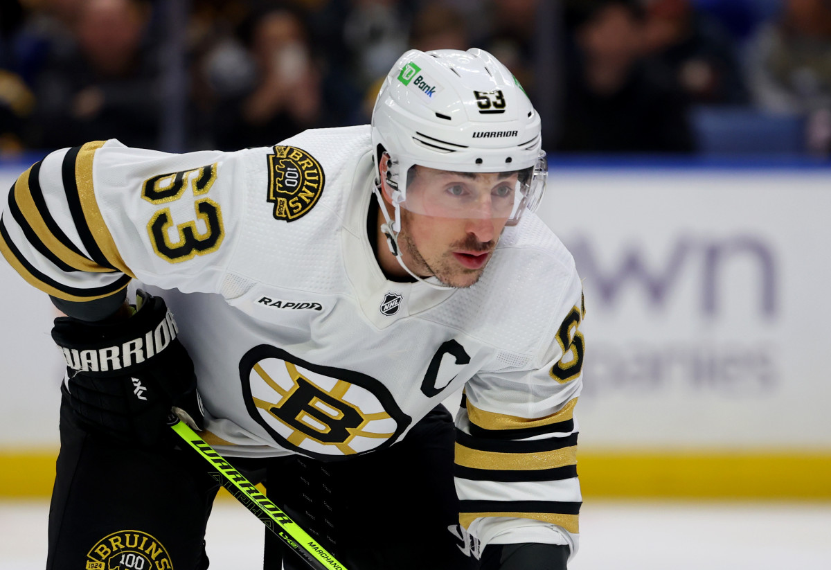 Dec 27, 2023; Buffalo, New York, USA; Boston Bruins left wing Brad Marchand (63) waits for the face-off during the first period against the Buffalo Sabres at KeyBank Center. Mandatory Credit: Timothy T. Ludwig-USA TODAY Sports